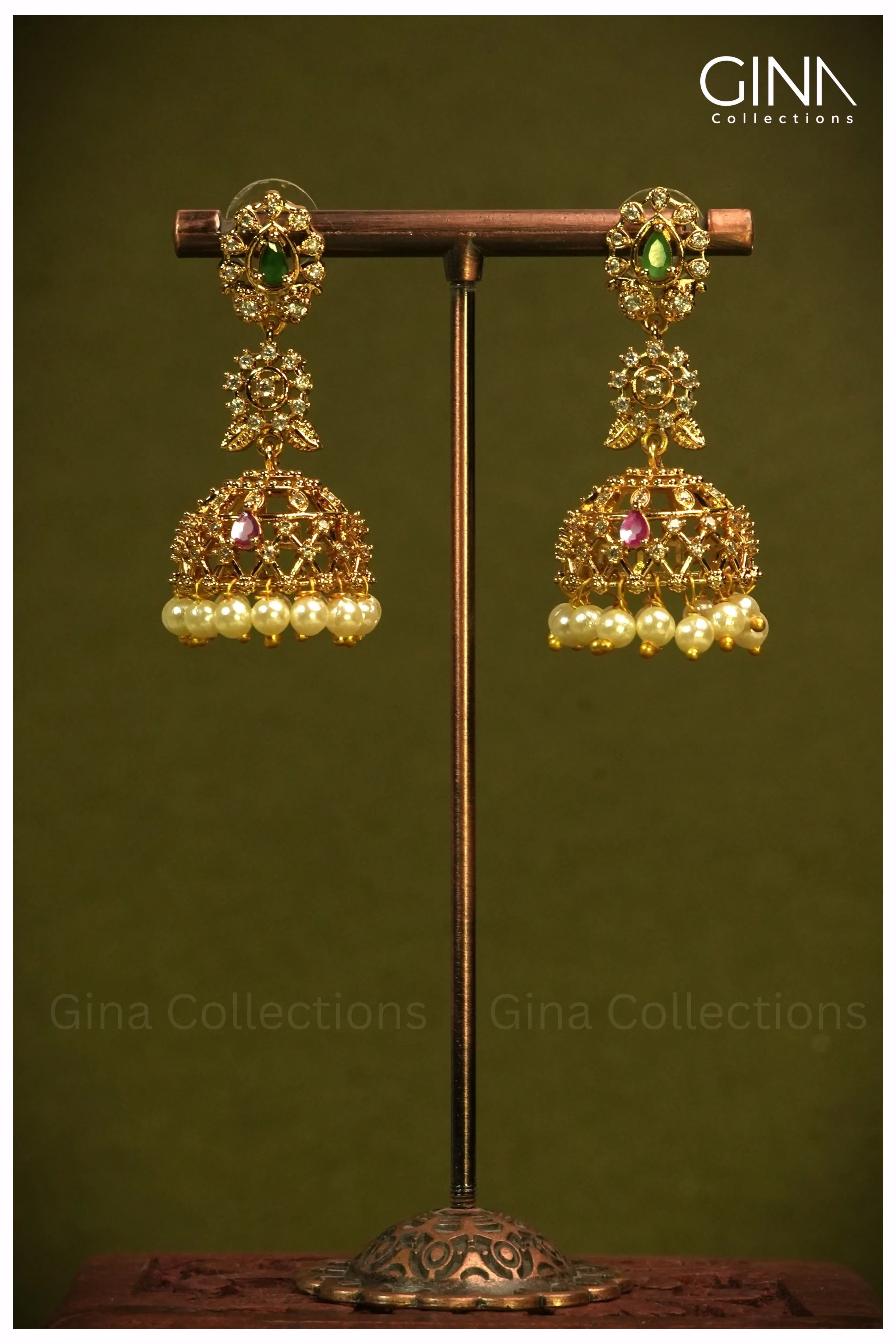 Jhumkas featuring Zircon Stones and Pearl Beaded Drops