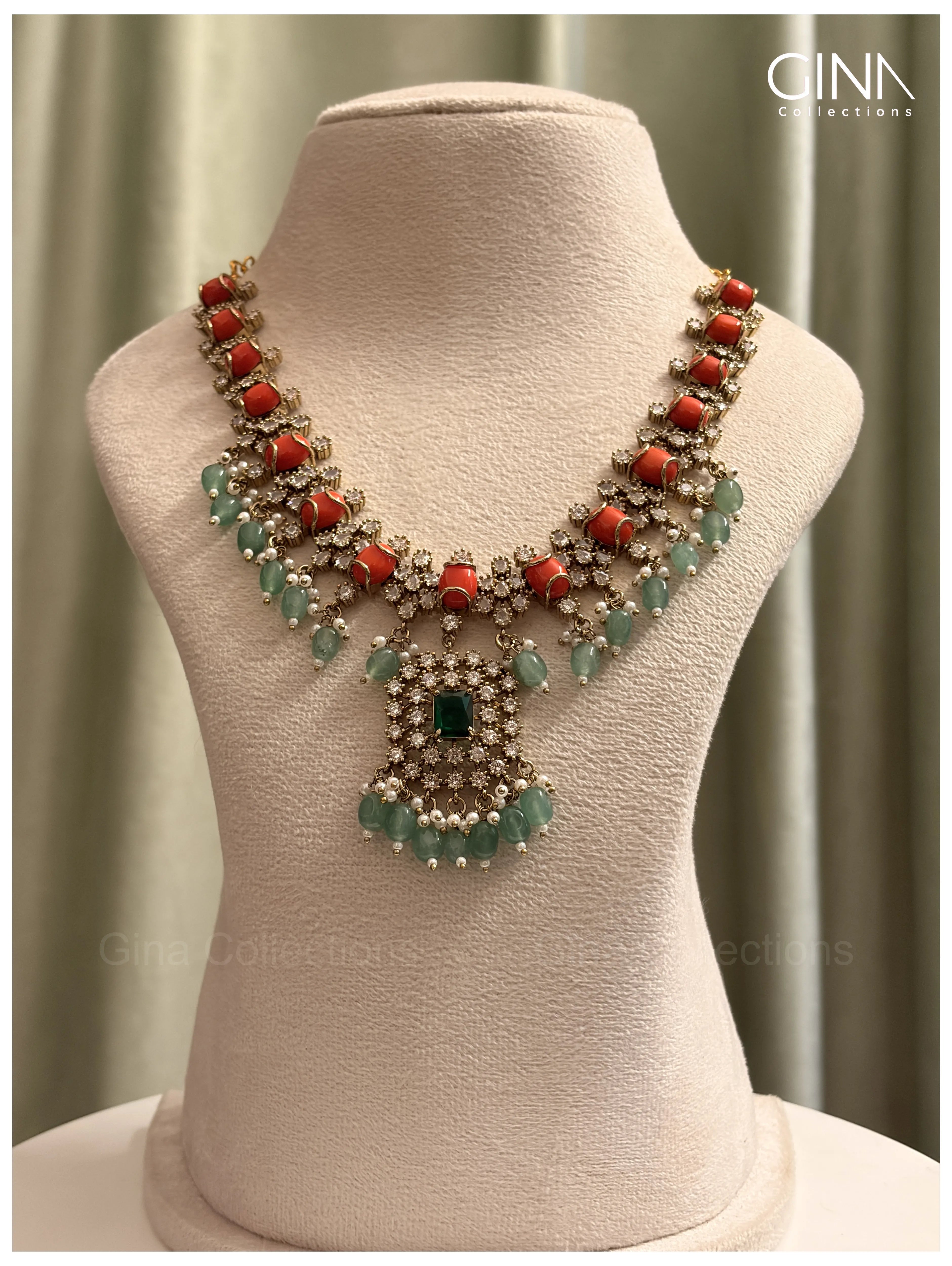Shimmering Pavazham with Emerald Drops