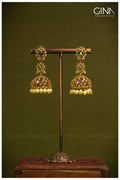 Jhumkas featuring Zircon Stones and Pearl Beaded Drops