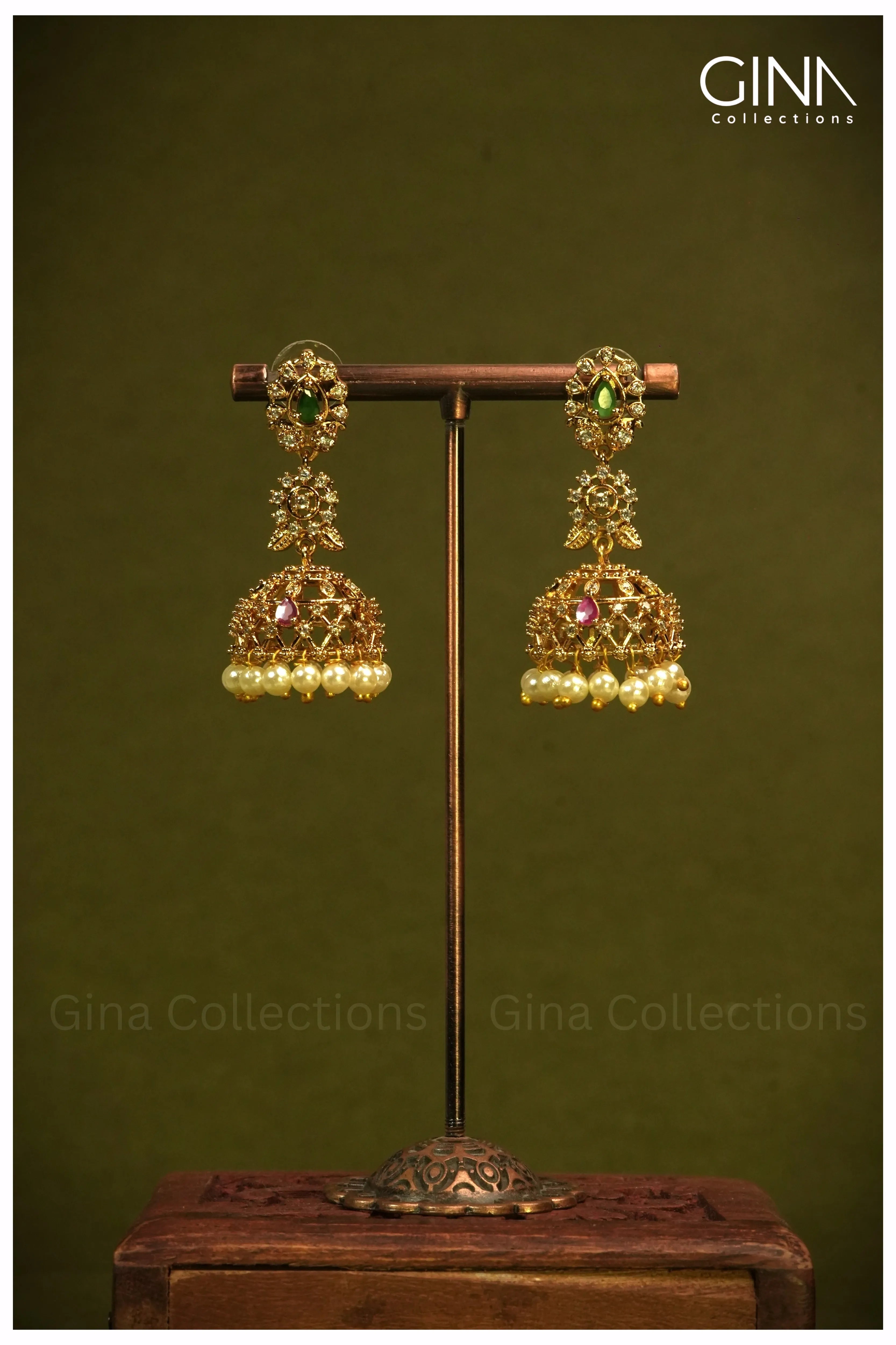 Jhumkas featuring Zircon Stones and Pearl Beaded Drops