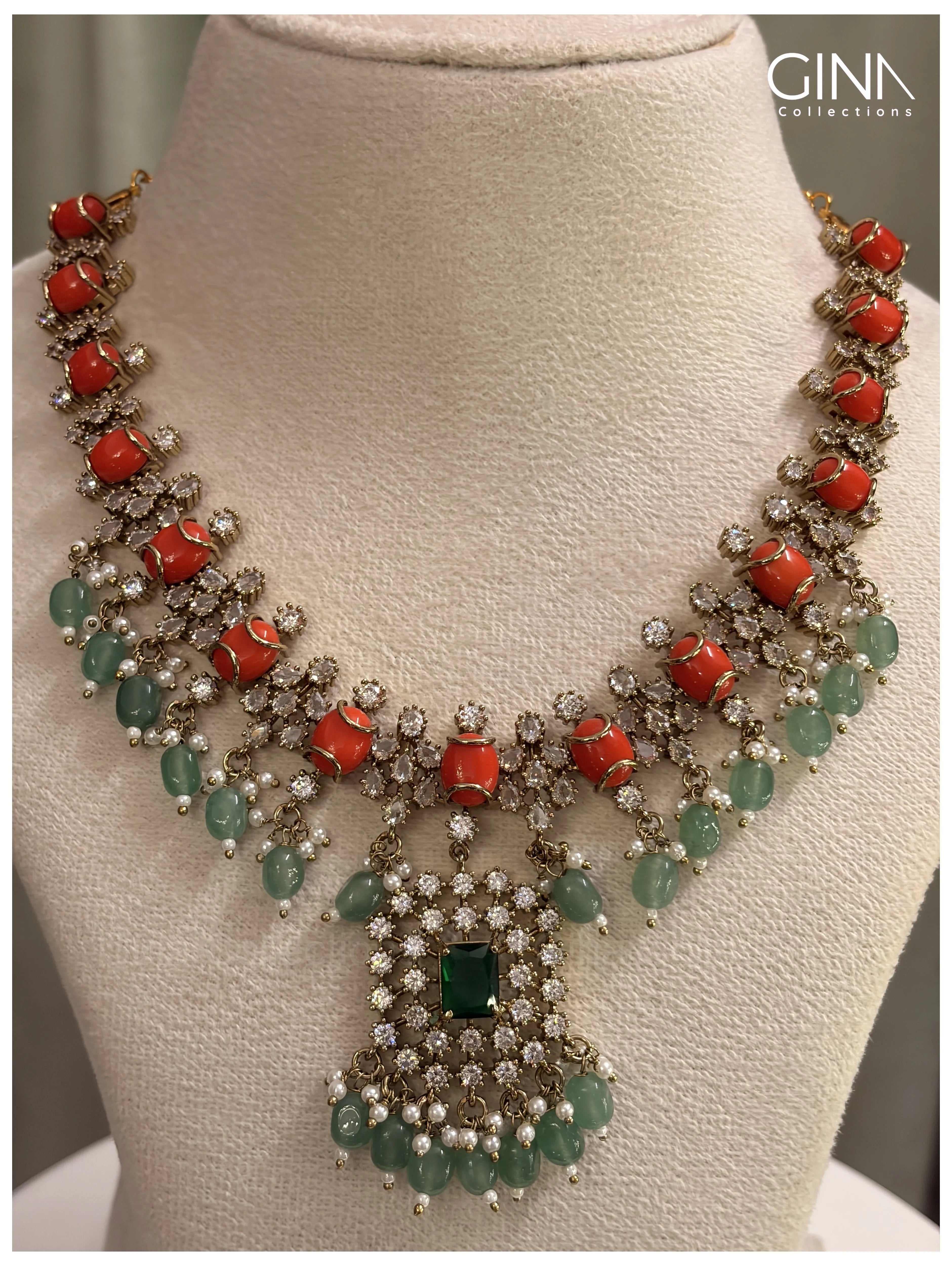 Shimmering Pavazham with Emerald Drops